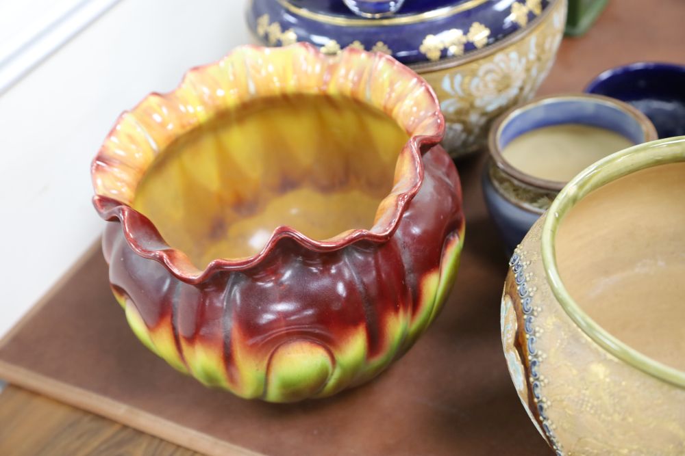 Two Doulton stoneware jardinieres, three similar small pots and a Bretby jardiniere (6)